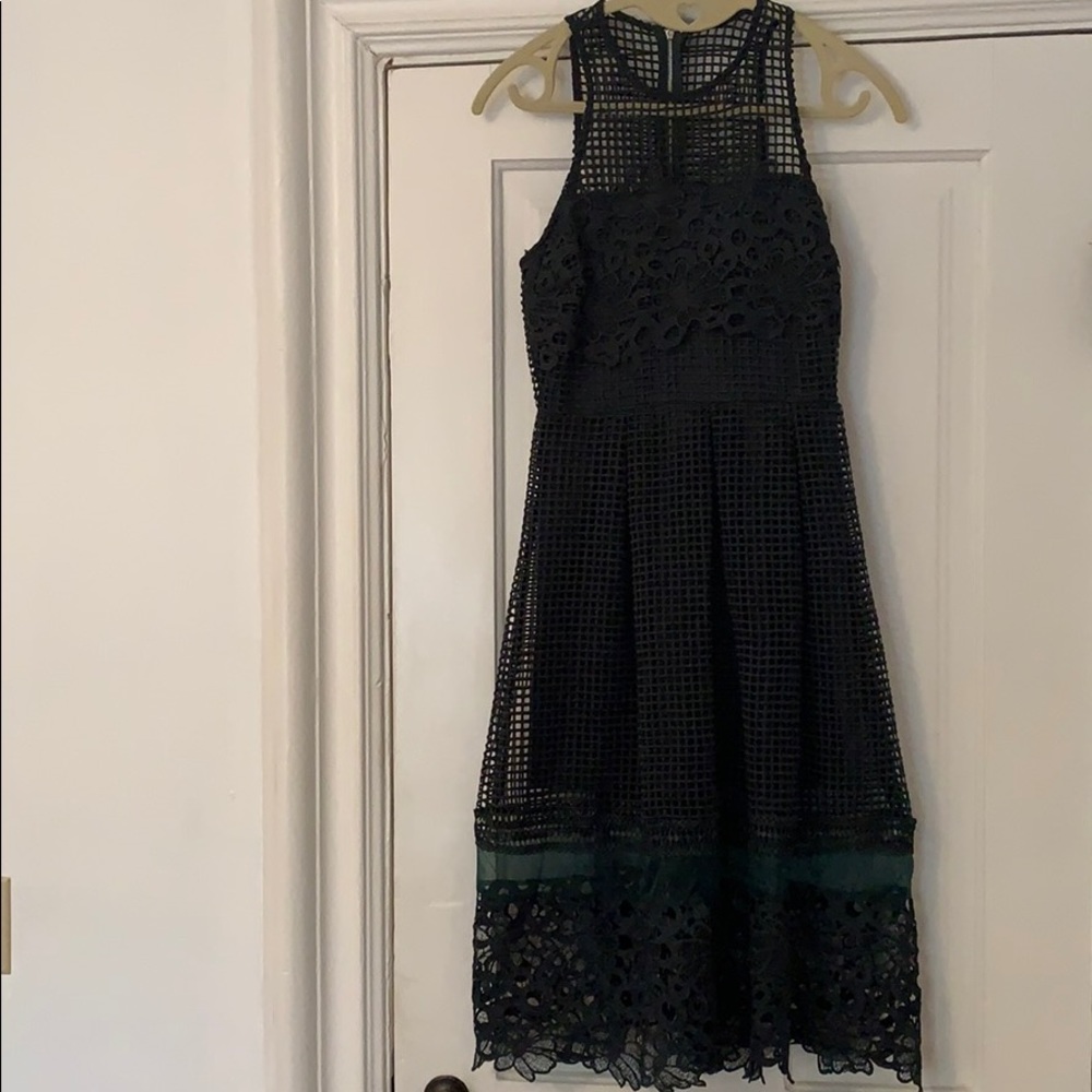 Hunter green floral dress—perfect for the holidays